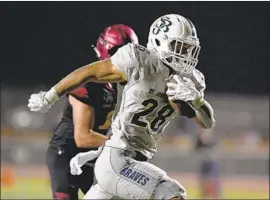  ?? Michael Owen Baker For The Times ?? RUNNING BACK George Holani and Bellf lower St. John Bosco (13-0) face Santa Ana Mater Dei (11-2) on Friday in the Southern Section Division 1 title game.