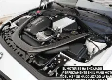  ??  ?? EL MOTOR SE HA ENCAJADO PERFECTAME­NTE EN EL VANO MOTOR DEL M2 Y SE HA COLOCADO LA BARRA ENTRE TORRETAS DE PLÁSTICO REFORZADO CON FIBRA DE CARBONO (CFRP) COMO LLEVAN LOS M3/M4.