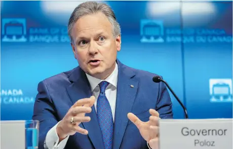  ?? DARREN BROWN/THE CANADIAN PRESS ?? Bank of Canada governor Stephen Poloz brushed aside concerns about U.S. President Donald Trump’s trade vandalism and raised its benchmark interest rate a quarter point to 1.5 per cent on Wednesday. The bigger story in the Bank of Canada’s new Monetary...