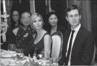  ?? The Associated Press ?? NEW TRADEMARKS: Ivanka Trump, second from right, the daughter and assistant to President Donald Trump, is seated with her husband, White House senior adviser Jared Kushner, right, during an April 6 dinner with President Donald Trump and Chinese...