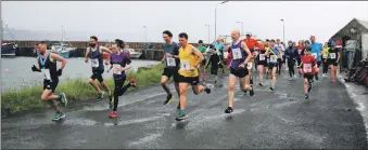  ?? ?? The wet and wild weather did not dampen spirits as the Great Carradale Canter kicked off.