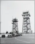  ?? COURTESY OF USC DIGITAL LIBRARY ?? On Aug. 8, 1951, the new LAX control tower, right, rises higher than its predecesso­r, a former forestry station.