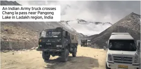  ??  ?? An Indian Army truck crosses Chang la pass near Pangong Lake in Ladakh region, India