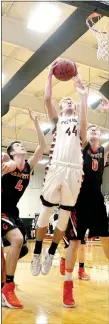  ?? TIMES photograph by Annette Beard ?? Blackhawk senior Joey Hall jumped for a layup during the intense competitio­n Monday night against the Gravette Lions. Hall led all scorers with 19.