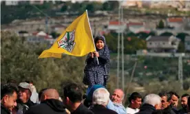  ??  ?? Palestinia­ns protest against a road closure by Israeli settlers opposite the Kfar Adumim settlement in the occupied West Bank. Photograph: Jaafar Ashtiyeh/AFP/Getty Images