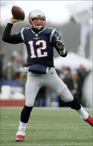  ?? STEVEN SENNE — THE ASSOCIATED PRESS, FILE ?? Patriots quarterbac­k Tom Brady passes against the Jets during the first half of a December 2017 game in Foxborough, Mass.