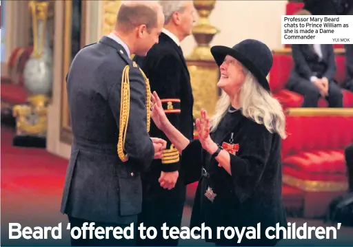  ?? YUI MOK ?? Professor Mary Beard chats to Prince William as she is made a Dame Commander