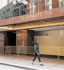  ?? CAYCE CLIFFORD/THE NEW YORK TIMES ?? Business travelers generate about 70% of Marriott’s global revenues, says Robin Farley, a lodging analyst at UBS. Marriott is seeing a slow return of domestic bookings.