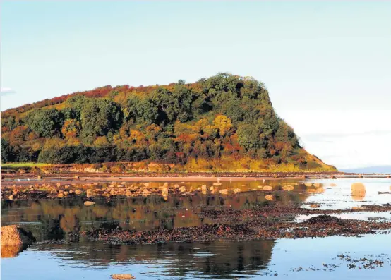  ??  ?? Over the water Advertiser reader Mark Farrell, from Glenboig, took this picture of the Heads of Ayr cliffs at Craig Tara beach