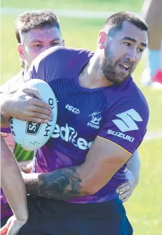  ?? Picture: GETTY IMAGES ?? COMING THROUGH: Nelson Asofa-Solomona takes on the defence at training on the Sunshine Coast this week.