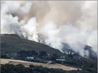  ??  ?? Gorse fire raging on Bray Head in mid-July.