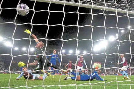  ?? ap ?? What a shame: Chelsea’s axel disasi (centre) scores their third goal before it was ruled out for a foul via Var during the premier league match against aston Villa. —