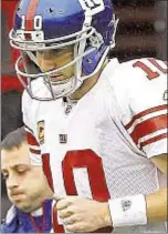  ?? GETTY ?? Equipment staffers at center of Eli Manning helmet lawsuit are fired.