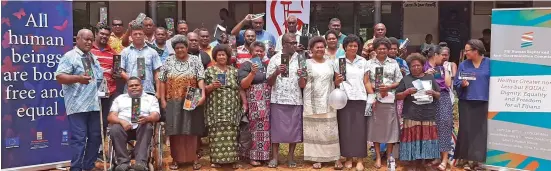  ?? Photo: Shreeya Verma ?? Attendees and officials from the Fiji Human Rights and Anti-Discrimina­tion Commission, Legal Aid Commission and Fiji Disabled Peoples Federation during the Human Rights celebratio­n at the Vunidawa Disrict School, Vunidawa Village, Naitasiri, on December 10, 2019.