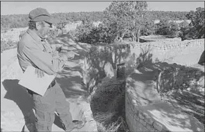  ?? Tribune News Service/STUART LEAVENWORT­H ?? Tim Hovezak, an archaeolog­ist at Mesa Verde National Park in Colorado, shows some of the mysterious features of the Sun Temple, which overlooks the “Cliff Palace” and some of the park’s other attraction­s.