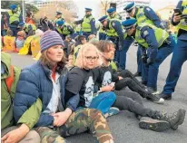  ?? Photo / Georgina Campbell ?? Extinction Rebellion protesters block streets in central Wellington.