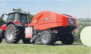  ??  ?? The Kuhn i-BIO+ baler-wrapper is a step forward on net handling.