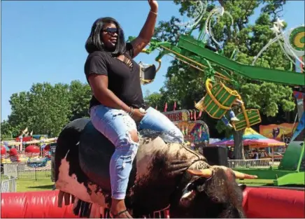  ?? FILE PHOTOS ?? Ride a bull if you like at the Saratoga County Fair.