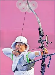  ?? PTI ?? Indian archer Deepika Kumari competes in the women’s individual 1/32 eliminatio­ns round at Yumenoshim­a Park Archery Field in Tokyo on Wednesday. —