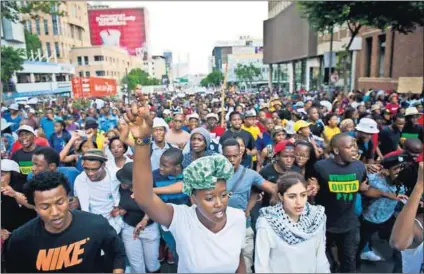  ?? Photo: Delwyn Verasamy ?? Changing the world: New incoming Wits SRC president Nompendulo Mkatshwa (22), with hand raised and pointing forward, leads her fellow Wits students in protest.