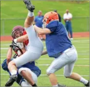  ?? SAM STEWART — DIGITAL FIRST MEDIA ?? Pottsgrove’s Adam Girafalco makes a catch in traffic for Team Freedom.