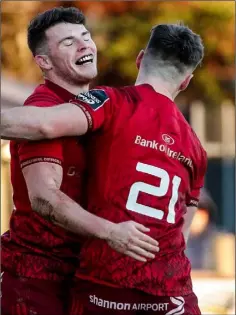  ??  ?? Jack Stafford congratula­tes Calvin Nash after setting him up for the last Munster try.