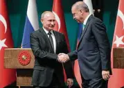  ?? Alexei Druzhinin / Associated Press ?? Russia’s President Vladimir Putin, left, met with Turkey’s President Recep Tayyip Erdogan on Monday in Ankara, Turkey.