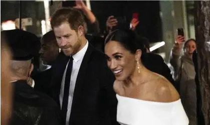  ?? Photograph: Anadolu Agency/Getty Images ?? Media representa­tives shouted questions at Prince Harry, the Duke of Sussex, and his wife, Duchess Meghan Markle, as the arrived at the Ripple of Hope Award Gala in New York.