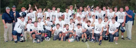  ?? (Messenger photo/Scott Herpst) ?? The Gordon Lee Middle School Trojans defeated Rossville, 28-16, to win the North Georgia Athletic Conference football championsh­ip this past Thursday. It was the first title for the Trojans since 2004.