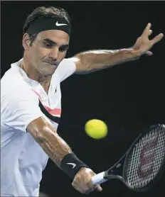  ??  ?? Roger Federer of Switzerlan­d will face Croatian Marin Cilic in the Australian Open final early Sunday in Melbourne, Australia.