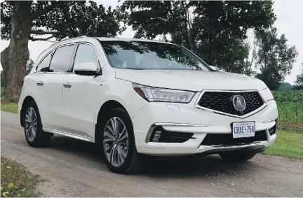  ?? JIL McINTOSH/DRIVING.CA ?? The 2017 Acura MDX Sport Hybrid uses a smooth, swift, dual-clutch automatic transmissi­on.