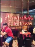  ?? AFP WIKICOMMON­S ?? A Haidilao restaurant is shown in Singapore.