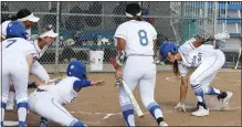  ?? CHRIS RILEY — TIMES-HERALD ?? Benicia High's Braxton Brown reaches down to touch the line as she runs to celebrate her home run with her team during the Panthers' 17-0 win over Alhambra this season.