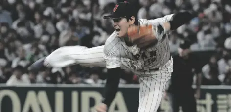  ?? TORU HANAI/AP ?? SHOHEI OHTANI OF JAPAN throws during the fifth inning of the quarterfin­al game between Italy and Japan at the World Baseball Classic (WBC) at Tokyo Dome in Tokyo, Japan on Thursday.