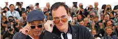  ?? FOTO: LE CAER/INVISION/DPA ?? Brad Pitt (l.) und Quentin Tarantino im Mai in Cannes.