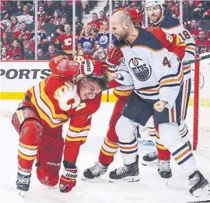  ?? DEREK LEUNG GETTY IMAGES ?? Earning two points will be more important than settling scores when Zack Kassian, right, and the Oilers face Matthew Tkachuk and the Flames on Wednesday in a Pacific Division tilt.