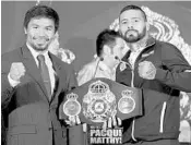  ?? YAM G-JUN/ASSOCIATED PRESS ?? Manny Pacquiao, left, and Lucas Matthysse meet the media Thursday in Kuala Lumpur, Malaysia.