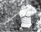  ?? MADDIE MEYER/GETTY ?? Bryson DeChambeau plays his shot from the 14th tee during the third round of the 2021 Wells Fargo Championsh­ip on Saturday.