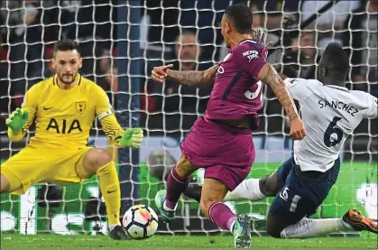  ??  ?? Jesus opens the scoring by drilling the ball past Lloris to put City in the driving seat at Wembley last night OFF THE MARK: