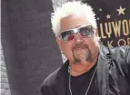  ?? FILE PHOTO ?? Guy Fieri, the host of “Diners, Drive-ins and Dives,” was born in Columbus and took part in a 2009 episode called “A North Pole Christmas.”