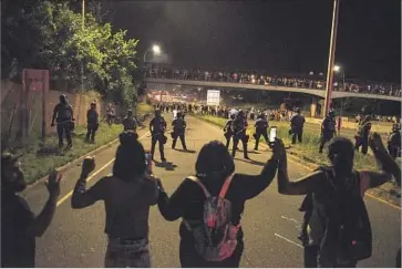  ?? Stephen Maturen Getty Images ?? IN MINNESOTA, bills may boost penalties for obstructin­g roadways. One lawmaker says drivers with family emergencie­s were blocked when activists shut down this St. Paul freeway after a police shooting last summer.