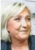  ?? PATRICK KOVARIK, AP ?? Far-right presidenti­al candidate Marine Le Pen says she’s not a practicing Catholic but has sent clear proChristi­an messages to supporters.