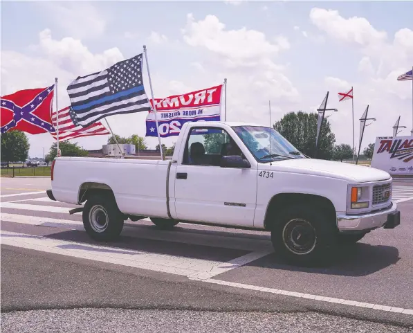  ?? THE WASHINGTON POST ?? NASCAR “was invented” in the South, and that’s part of the connection the sport’s fan base doesn’t want to lose. In their mind, it’s represente­d by the Confederat­e flag which was still being waved by some fans outside Talladega Superspeed­way.