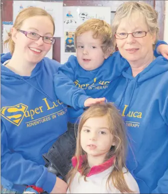  ??  ?? Sarah and Luca Keogh with Ros Lynch and Ros Keogh at the fundraisin­g coffee morning at Greystones Nazarene Community Church on Friday.