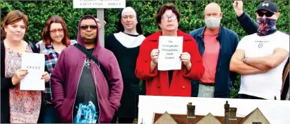  ?? ?? AGGRIEVED PARTY: Pride supporters held a protest yesterday close to the home of Mary Carberry