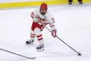  ?? Josh Jurgens/AP ?? Boston University's Macklin Celebrini looks to pass the puck against Rochester during an NCAA men's college hockey tournament regional game in March. Photograph: