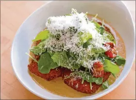  ?? CONTRIBUTE­D BY SEED KITCHEN & BAR ?? 1 bunch local arugula12 cherry tomatoes, fresh or oven-dried 3 tablespoon­s olive oil1 tablespoon fresh lemon juice1/2 teaspoon kosher salt1/4 cup finely shredded Parmesan