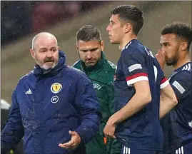  ?? ?? Ross Stewart made his debut for Scotland on Wednesday night after helping Sunderland to promotion to the Championsh­ip in England (left)