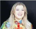  ?? REBECCA CABAGE/INVISION/AP ?? Kelly Clarkson is the godmother of Norwegian Cruise Line’s newest ship, Norwegian Encore, which will be christened in Miami.