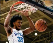  ?? ASSOCIATED PRESS ?? IN THIS JAN. 27 file photo, Duke’s Marvin Bagley III (35) dunks the ball during the first half of an NCAA college basketball game against Virginia in Durham, N.C.